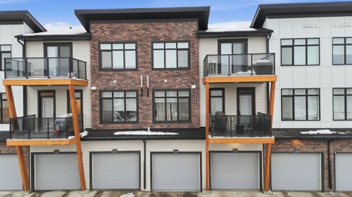 208-562 Seton Circle Se, Calgary, AB - Outdoor With Balcony With Facade