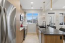 208-562 Seton Circle Se, Calgary, AB  - Indoor Photo Showing Kitchen With Upgraded Kitchen 