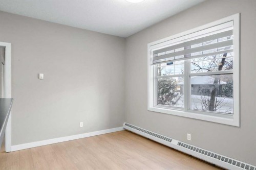 115-1414 17 Street Se, Calgary, AB - Indoor Photo Showing Other Room
