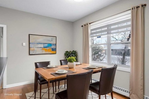 115-1414 17 Street Se, Calgary, AB - Indoor Photo Showing Dining Room
