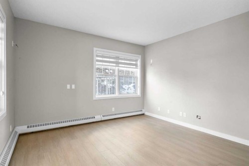 115-1414 17 Street Se, Calgary, AB - Indoor Photo Showing Other Room