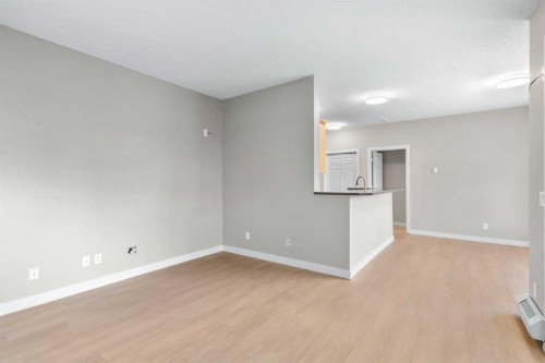 115-1414 17 Street Se, Calgary, AB - Indoor Photo Showing Other Room