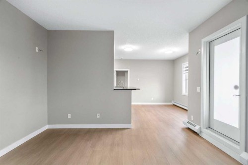 115-1414 17 Street Se, Calgary, AB - Indoor Photo Showing Other Room