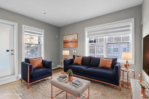 115-1414 17 Street Se, Calgary, AB - Indoor Photo Showing Living Room
