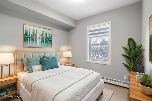 115-1414 17 Street Se, Calgary, AB - Indoor Photo Showing Bedroom
