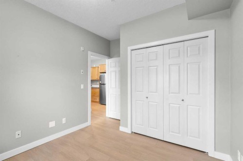 115-1414 17 Street Se, Calgary, AB - Indoor Photo Showing Other Room