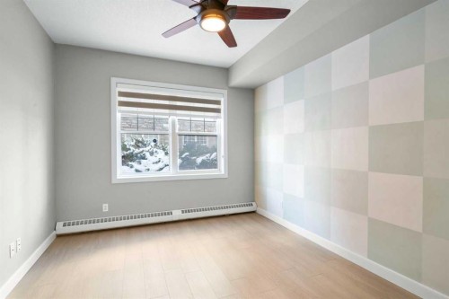 115-1414 17 Street Se, Calgary, AB - Indoor Photo Showing Other Room
