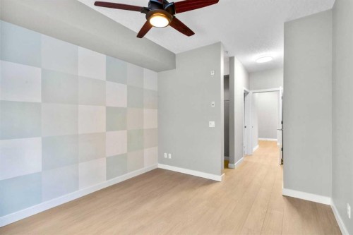 115-1414 17 Street Se, Calgary, AB - Indoor Photo Showing Other Room
