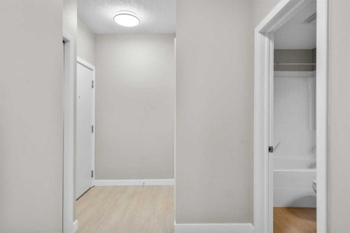 115-1414 17 Street Se, Calgary, AB - Indoor Photo Showing Other Room