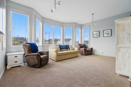 109 Crystal Green Bay, Okotoks, AB - Indoor Photo Showing Living Room