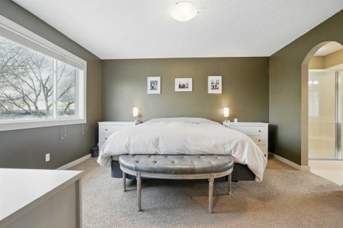 109 Crystal Green Bay, Okotoks, AB - Indoor Photo Showing Bedroom