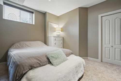 109 Crystal Green Bay, Okotoks, AB - Indoor Photo Showing Bedroom