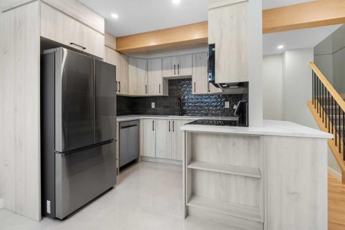 5-5520 1 Avenue Se, Calgary, AB - Indoor Photo Showing Kitchen With Stainless Steel Kitchen