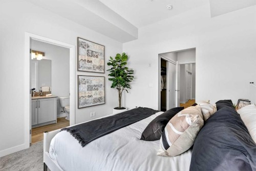101-255 Les Jardins Park Se, Calgary, AB - Indoor Photo Showing Bedroom