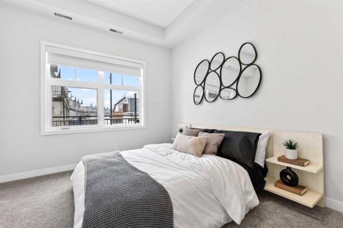 101-255 Les Jardins Park Se, Calgary, AB - Indoor Photo Showing Bedroom