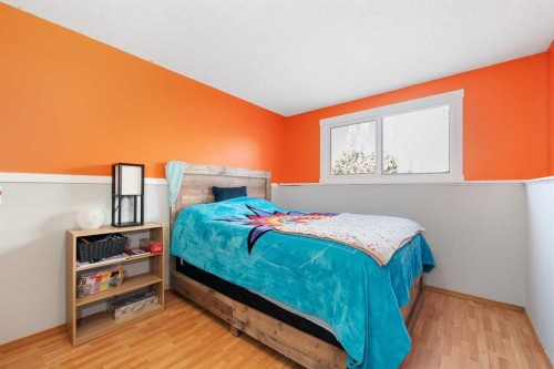 24 Brentwood Drive, Strathmore, AB - Indoor Photo Showing Bedroom