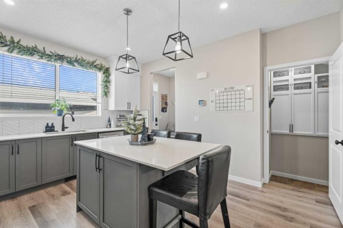 136 Dawson Drive, Chestermere, AB - Indoor Photo Showing Kitchen With Upgraded Kitchen