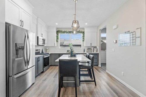 136 Dawson Drive, Chestermere, AB - Indoor Photo Showing Kitchen With Stainless Steel Kitchen With Upgraded Kitchen