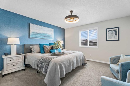 136 Dawson Drive, Chestermere, AB - Indoor Photo Showing Bedroom