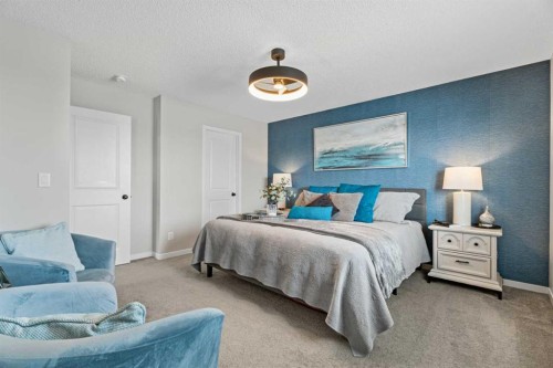 136 Dawson Drive, Chestermere, AB - Indoor Photo Showing Bedroom
