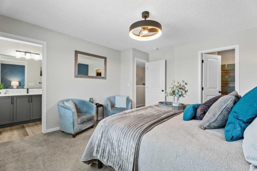 136 Dawson Drive, Chestermere, AB - Indoor Photo Showing Bedroom