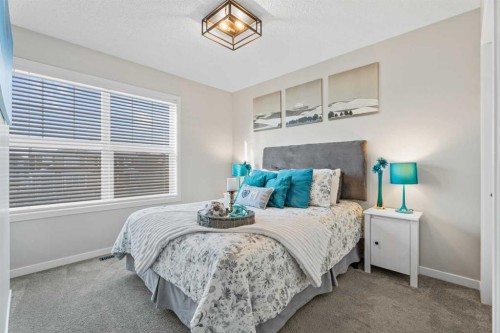 136 Dawson Drive, Chestermere, AB - Indoor Photo Showing Bedroom