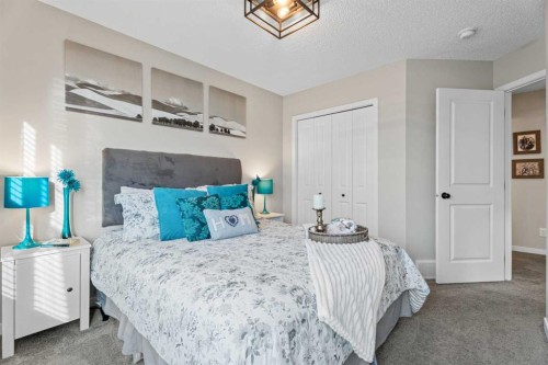136 Dawson Drive, Chestermere, AB - Indoor Photo Showing Bedroom