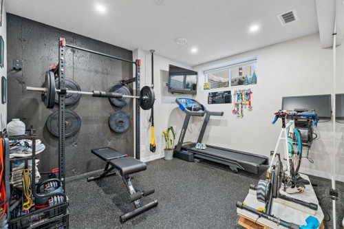 136 Dawson Drive, Chestermere, AB - Indoor Photo Showing Gym Room
