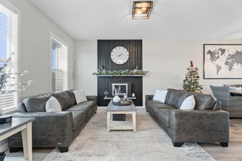136 Dawson Drive, Chestermere, AB - Indoor Photo Showing Living Room With Fireplace