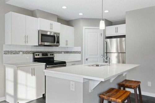 706-881 Sage Valley Boulevard Nw, Calgary, AB - Indoor Photo Showing Kitchen With Stainless Steel Kitchen With Upgraded Kitchen