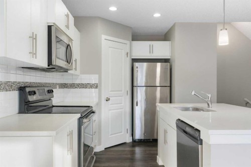 706-881 Sage Valley Boulevard Nw, Calgary, AB - Indoor Photo Showing Kitchen With Stainless Steel Kitchen With Upgraded Kitchen
