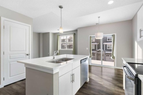 706-881 Sage Valley Boulevard Nw, Calgary, AB - Indoor Photo Showing Kitchen With Double Sink With Upgraded Kitchen