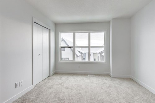 202-437 Alpine Avenue Sw, Calgary, AB - Indoor Photo Showing Other Room