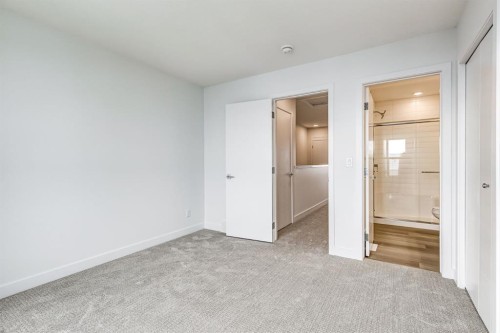 202-437 Alpine Avenue Sw, Calgary, AB - Indoor Photo Showing Other Room