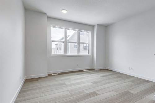 202-437 Alpine Avenue Sw, Calgary, AB - Indoor Photo Showing Other Room