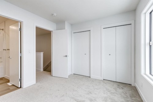 202-437 Alpine Avenue Sw, Calgary, AB - Indoor Photo Showing Other Room