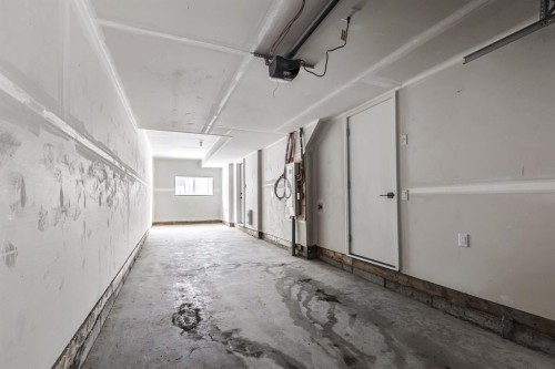 202-437 Alpine Avenue Sw, Calgary, AB - Indoor Photo Showing Other Room