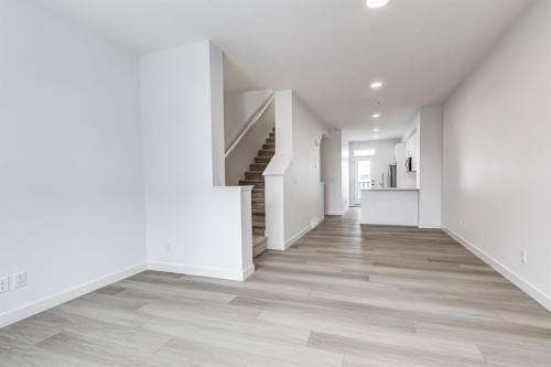 202-437 Alpine Avenue Sw, Calgary, AB - Indoor Photo Showing Other Room