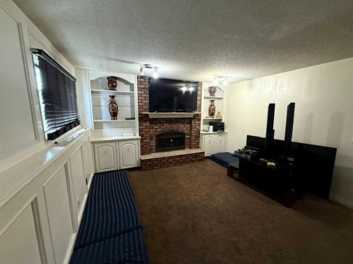 103 Templeson Way Ne, Calgary, AB - Indoor With Fireplace
