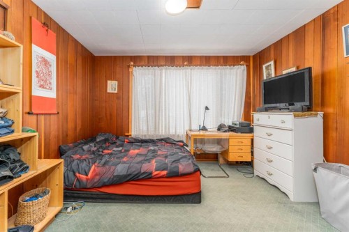 77 Grotto Road, Harvie Heights, AB - Indoor Photo Showing Bedroom