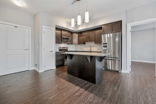 2403-3727 Sage Hill Drive, Calgary, AB - Indoor Photo Showing Kitchen With Upgraded Kitchen