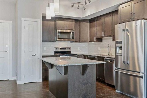 2403-3727 Sage Hill Drive, Calgary, AB - Indoor Photo Showing Kitchen With Upgraded Kitchen
