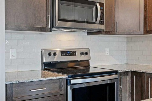 2403-3727 Sage Hill Drive, Calgary, AB - Indoor Photo Showing Kitchen