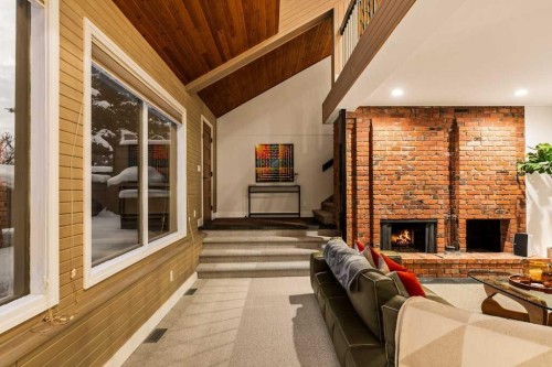 4-2200 Varsity Estates Drive Nw, Calgary, AB - Indoor Photo Showing Other Room With Fireplace