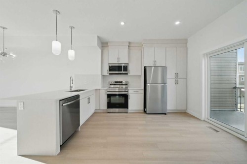 106-75 Cornerstone Row Ne, Calgary, AB - Indoor Photo Showing Kitchen With Stainless Steel Kitchen