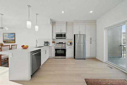 106-75 Cornerstone Row Ne, Calgary, AB - Indoor Photo Showing Kitchen With Stainless Steel Kitchen