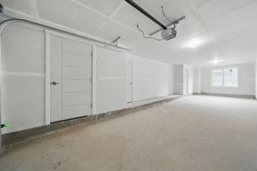106-75 Cornerstone Row Ne, Calgary, AB - Indoor Photo Showing Garage