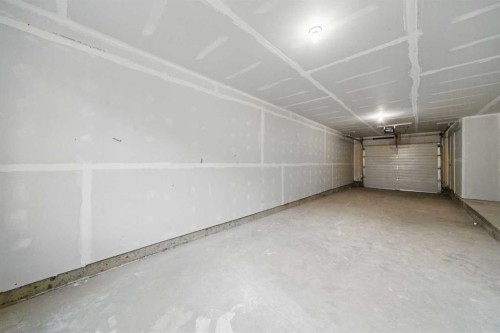 106-75 Cornerstone Row Ne, Calgary, AB - Indoor Photo Showing Garage