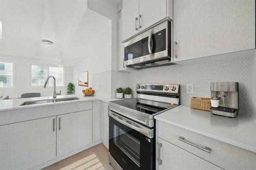 106-75 Cornerstone Row Ne, Calgary, AB - Indoor Photo Showing Kitchen With Stainless Steel Kitchen With Upgraded Kitchen