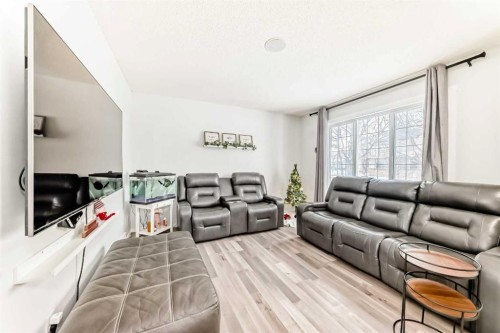 16 Saddlebrook Place Ne, Calgary, AB - Indoor Photo Showing Living Room